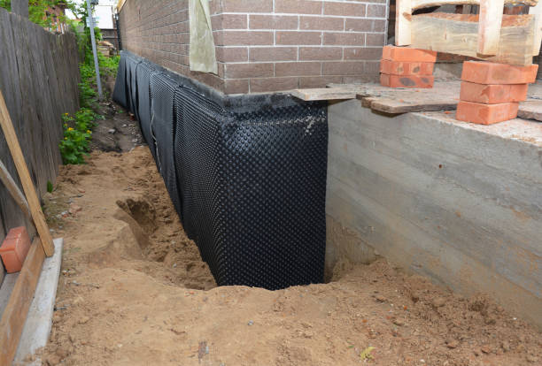 SJ Waterproofing Pros technician performing targeted Exterior Waterproofing assessment in Columbia Station, OH